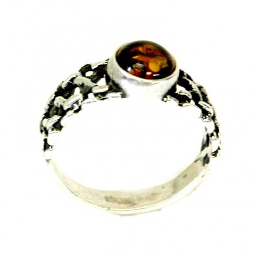 Très originale la bague en argent massif et son anneau tressé 