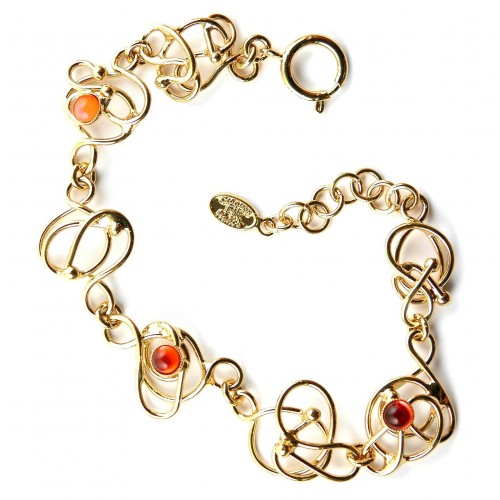 Bracelet fantaisie avec des cabochons oranges. Bijou artisanal fait main.