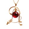 Pendentif fantaisie-bijou artisanal.