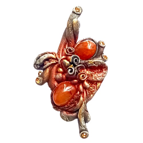 Broche en résine couleur marron avec une jolie cornaline