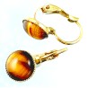 Boucles d'oreilles avec des  pierres véritables.