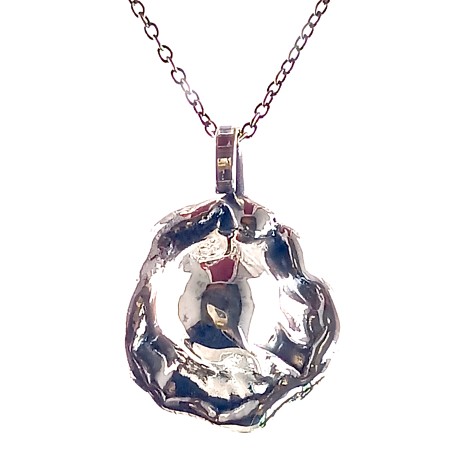 Bijoux artisanaux : pendentif bombé en argent vieilli