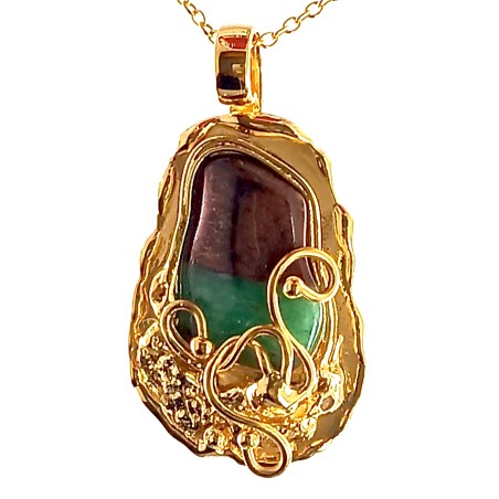 Original et unique pendentif artisanal fait main.