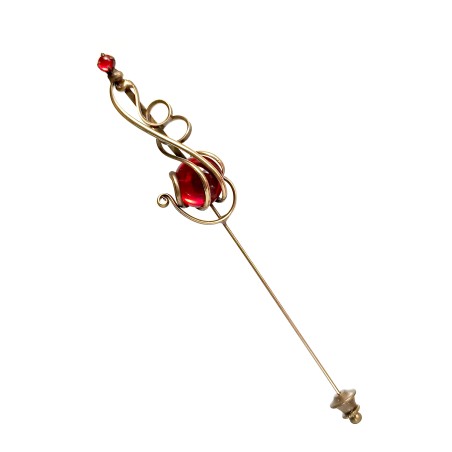 Épingle de créateur en bronze patiné.