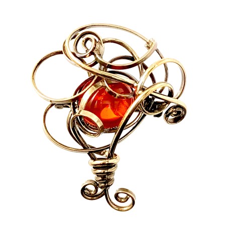 Broche fantaisie dorée, finition artisanale avec une pierre de couleur orange.