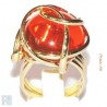 Coup de coeur pour cette bague en fils de laiton doré rehaussée d'un strass en verre teinté de couleur orange.