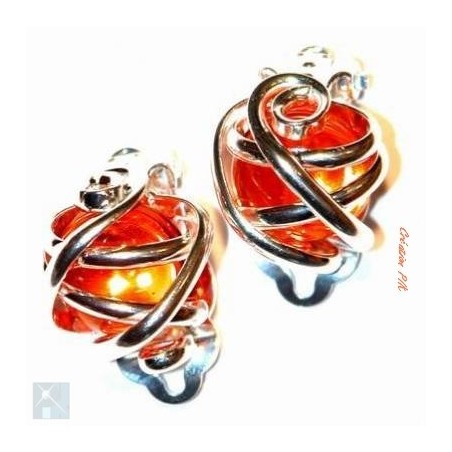 Boucles d'oreilles clips argent et orange.