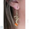 Boucles d'oreilles en fils entrelacés, oranges.